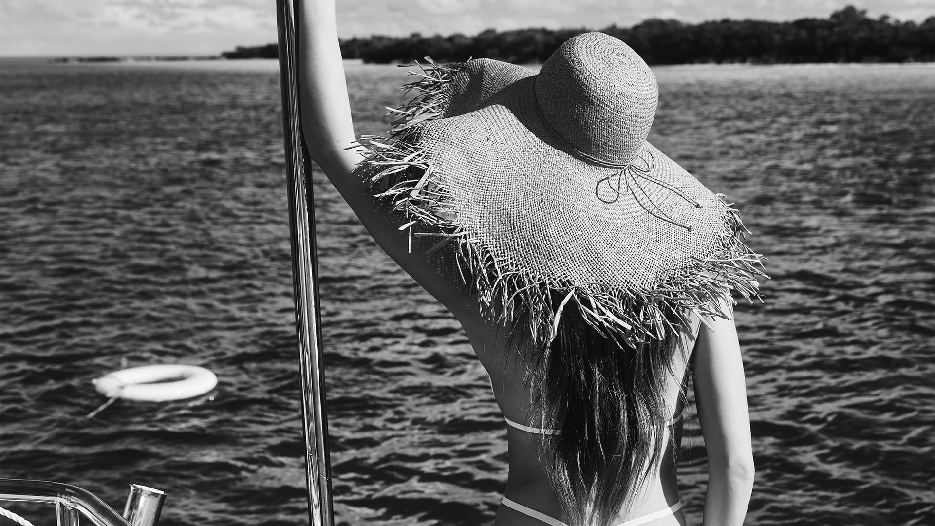 A guest at the water's edge in Turks and Caicos
